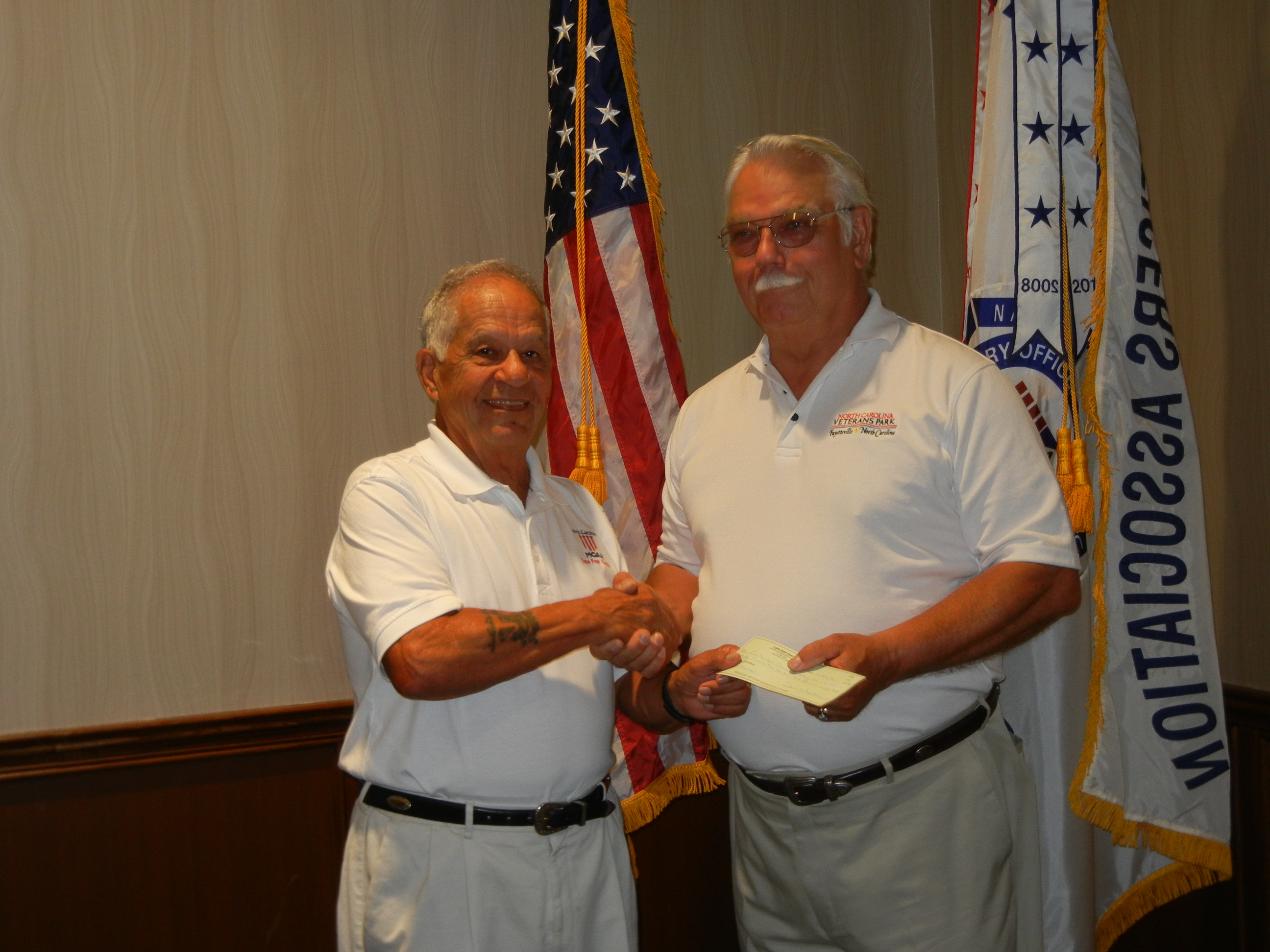At the Memorial Day Ceremony Juan Chavez, president of the Cape Fear Chapter, MOAA, presented Don Talbot, chairman of the Freedom Memorial Park steeting committee and the GWOT fund raising committee, with a check for $19,300.00 with a promise to meet a goal of $25,000.00.
